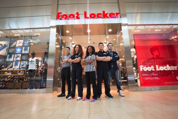 Foot Locker employees standing outside store