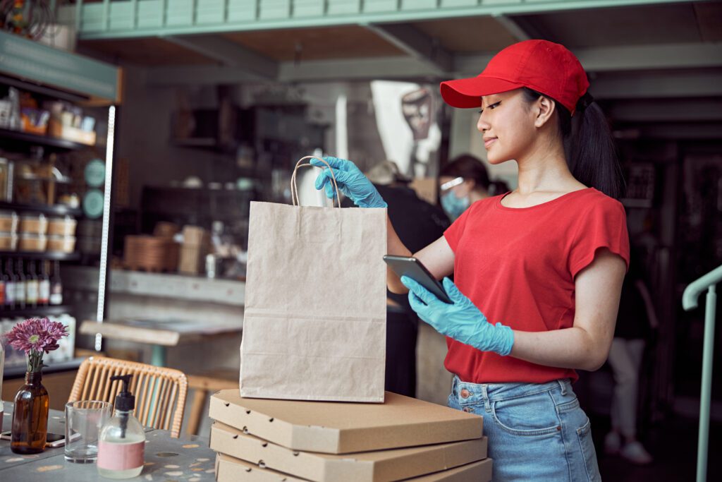 Restaurant worker preparing an order